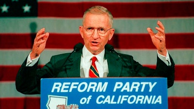 In this June 1, 1996, file photo, former presidential candidate Ross Perot addresses the first California statewide convention of the Reform Party, a new political party he founded, at the Los Angeles Convention Center in Los Angeles. Perot, the Texas billionaire who twice ran for president, has died, a family spokesperson said Tuesday, July 9, 2019.