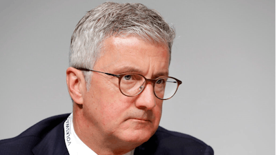 In this Thursday, May 3, 2018 file photo, Rupert Stadler, then CEO of Audi AG, attends the shareholders' meeting of the Volkswagen stock company in Berlin, Germany. German prosecutors announced Wednesday July 31, 2019, that they have charged Rupert Stadler and three other individuals with fraud in connection with sales of diesel cars with software that enabled cheating on emissions tests.