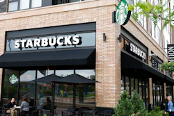 n this July 10, 2019, photo customers visit at a Starbucks in Minneapolis. Starbucks Corp. reports financial earnings on Thursday, July 25, 2019.