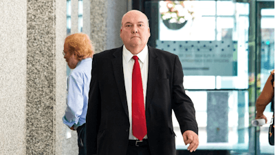 Former longtime Chicago Teamsters boss John T. Coli Sr. leaves the Dirksen Federal Courthouse in Chicago after pleading guilty to receiving a prohibited payment and filing a false income tax return, Tuesday morning, July 30, 2019.