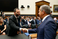 Facebook Head of Global Policy Development Matt Perault, left, shakes hands with Rep. David Cicilline, D-R.I., chair of the House Judiciary antitrust subcommittee, before testifying at a hearing.