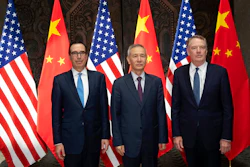 Chinese Vice Premier Liu He, center, poses with U.S. Trade Representative Robert Lighthizer, right, and Treasury Secretary Steven Mnuchin pose for photos before holding talks at the Xijiao Conference Center in Shanghai Wednesday, July 31, 2019.