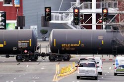- In this Feb. 13, 2018, file photo, automobile traffic waits at a train crossing as train cars that carry oil are pulled through downtown Seattle. Attorneys general for North Dakota and Montana have petitioned the Trump administration Wednesday, July 17, 2019, to overrule a Washington state law that imposes safety restrictions on oil shipped by rail from the Northern Plains.