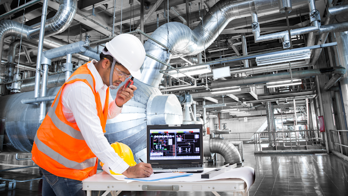 Electrical Engineer Working At Control Room Of Thermal Power Plant 656056938 3869x2579 (1)
