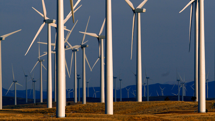 This file photo shows a wind turbine farm owned by PacifiCorp near Glenrock, Wyoming.