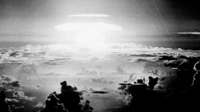 In this file photo, the fireball of a hydrogen bomb lights the Pacific sky a few seconds after the bomb was released over Bikini Atoll. A Texas-based company is facing criticism for naming a beer after the location of nuclear tests that resulted in the contamination of a Pacific island chain.