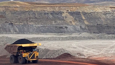 In this file photo a dump truck hauls coal at Contura Energy's Eagle Butte Mine near Gillette, Wyoming. The company made successful bids for mines closed since July 1.