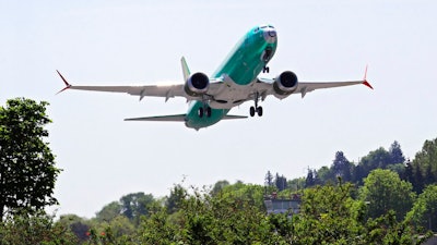 In this May 8, 2019, file photo a Boeing 737 MAX 8 jetliner being built for Turkish Airlines takes off on a test flight in Renton, Wash. On Wednesday, July 31, members of a Senate subcommittee clashed with Federal Aviation Administration officials, contending the agency was too deferential to Boeing in approving the 737 Max airliner.
