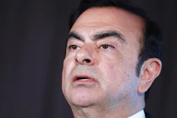 In this May 12, 2016, photo, then Nissan Motor Co. President and CEO Carlos Ghosn speaks during a press conference in Yokohama, near Tokyo. The wife of Carlos Ghosn is urging Emmanuel Macron to intercede on behalf of the former chairman of Nissan when the French leader meets with Japanese Prime Minister Shinzo Abe at the G-7 summit in France.