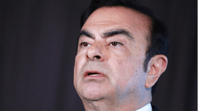 In this May 12, 2016, photo, then Nissan Motor Co. President and CEO Carlos Ghosn speaks during a press conference in Yokohama, near Tokyo. The wife of Carlos Ghosn is urging Emmanuel Macron to intercede on behalf of the former chairman of Nissan when the French leader meets with Japanese Prime Minister Shinzo Abe at the G-7 summit in France.