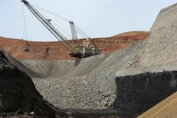 In this file photo, a dragline excavator moves rocks above a coal seam near Decker, Montana.