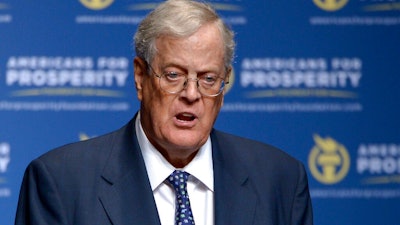 In this Aug. 30, 2013 file photo, David Koch speaks in Orlando, Fla. Koch, major donor to conservative causes and educational groups, has died on Friday, Aug. 23, 2019. He was 79.