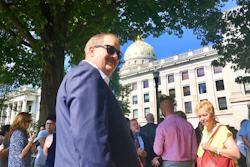In this Aug. 29, 2018 file photo former coal executive Don Blankenship waits outside the West Virginia Capitol after the Capitol was evacuated due to a fire alarm in Charleston, W.Va. A federal magistrate judge has recommended tossing Blankenship's misdemeanor conviction for conspiring to violate mine safety laws. U.S. Magistrate Judge Omar Aboulhson wrote Monday, Aug. 26, 2019 that Blankenship’s rights were violated under the Brady rule, which says suppression of evidence favorable to the accused violates due process.