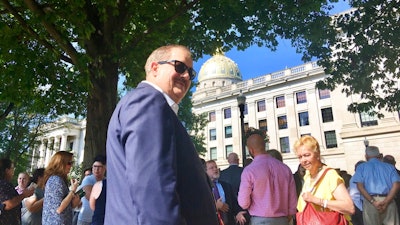 In this Aug. 29, 2018 file photo former coal executive Don Blankenship waits outside the West Virginia Capitol after the Capitol was evacuated due to a fire alarm in Charleston, W.Va. A federal magistrate judge has recommended tossing Blankenship's misdemeanor conviction for conspiring to violate mine safety laws. U.S. Magistrate Judge Omar Aboulhson wrote Monday, Aug. 26, 2019 that Blankenship’s rights were violated under the Brady rule, which says suppression of evidence favorable to the accused violates due process.