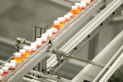 In this July 10, 2018, file photo bottles of medicine ride on a belt at a mail-in pharmacy warehouse in Florence, N.J. Drug companies are still raising prices for brand-name prescription medicines, just not as often or by as much as they used to, according to an Associated Press analysis.