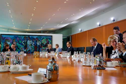 Members of the cabinet talk prior to the weekly cabinet meeting at the Chancellery in Berlin, Germany, Wednesday, Aug. 28, 2019.