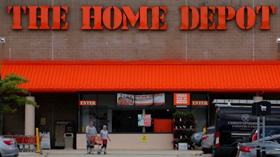 Shoppers leave the Home Depot store in Manchester, N.H., Thursday, Aug. 15, 2019. The Home Depot Inc. (HD) on Tuesday, Aug. 20, reported fiscal second-quarter net income of $3.48 billion. On a per-share basis, the Atlanta-based company said it had net income of $3.17.