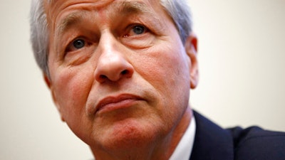 In this April 10, 2019, photo JPMorgan Chase chairman and CEO Jamie Dimon testifies before the House Financial Services Committee during a hearing on Capitol Hill in Washington. A group of influential CEOs, which included Dimon, is changing its view on corporations, saying it’s no longer just about shareholders. The Business Roundtable said Monday, Aug. 19, that its new statement on “the purpose of a corporation” emphasizes that all stakeholders are important, which includes workers, suppliers, customers and the communities their businesses are in.