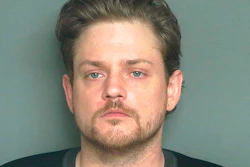 In this undated booking photo provided by the Eau Claire County Sheriff's Office is Kevin Pinkham. Pinkham, from Eau Claire, Wis., is charged with threatening to shoot up his workplace in Eau Claire. A criminal complaint filed in Eau County Circuit Court says Pinkham told a co-worker at Menards Distribution Center on Aug. 15, 2019 that he planned to 'shoot up the place.' Officials say four rifles and hundreds of rounds of ammunition were found at Pinkham's home, along with a pistol and ammunition in his car.