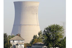 This Oct. 5, 2011 file photo shows the cooling tower of the Davis-Besse Nuclear Power Station in Oak Harbor, Ohio. A financial rescue for Ohio's nuclear plants and two coal-fired plants has infuriated environmentalists and conservatives. The plan signed into law it July 23, 2019 by Republican Gov. Mike DeWine calls for giving the state’s two nuclear plants $150 million a year through 2026.