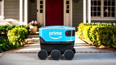 This undated photo provided by Amazon shows a self-driving delivery robot that Amazon is calling Scout. Amazon is expanding the use of its self-driving delivery robots to a second state. The online shopping giant says the six-wheeled robots, about the size of a Labrador, will start delivering packages to customers in Irvine, Calif. Amazon.com Inc. has been testing them in a Seattle suburb since the beginning of the year.