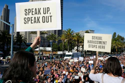 In this Nov. 1, 2018, file photo, Google employees hold up signs during a walkout rally at Harry Bridges Plaza in San Francisco to protest against what they said is the tech company's mishandling of sexual misconduct allegations against executives. Employees at Google, Amazon, Microsoft and elsewhere are increasingly speaking out about military warfare, immigration and the environment, and questioning the effects of their work. Experts say it’s an unprecedented trend of activism in Big Tech.