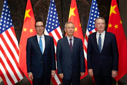 Chinese Vice Premier Liu He, center, poses with U.S. Trade Representative Robert Lighthizer, right, and Treasury Secretary Steven Mnuchin, for photos before holding talks at the Xijiao Conference Center in Shanghai Wednesday, July 31, 2019.