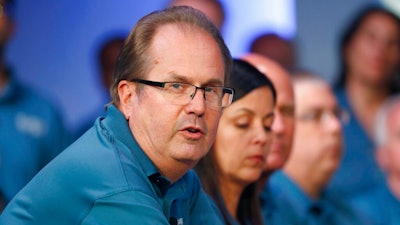 In this July 16, 2019, file photo, Gary Jones, United Auto Workers President, speaks during the opening of their contract talks with Fiat Chrysler Automobiles in Auburn Hills, Mich. On Wednesday, Aug. 28, 2019, an FBI spokesperson confirmed federal agents are searching Jones' suburban Detroit home apparently another step in an investigation of union corruption.
