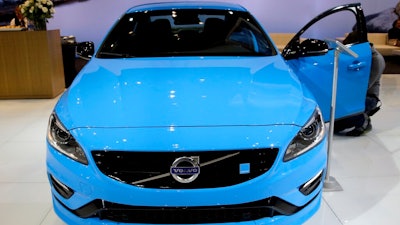 In this Feb. 6, 2014, file photo, Volvo displays the S60 Polestar during the media preview of the Chicago Auto Show at McCormick Place in Chicago. Volvo’s performance electric car brand, Polestar, has opened a factory in China to produce a gasoline-electric hybrid for export to Europe and the United States.