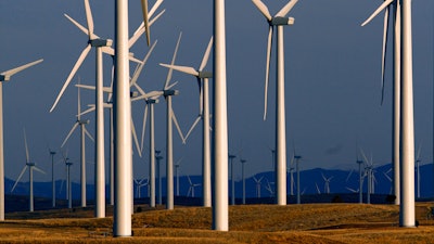 This file photo shows a wind turbine farm owned by PacifiCorp near Glenrock, Wyoming.