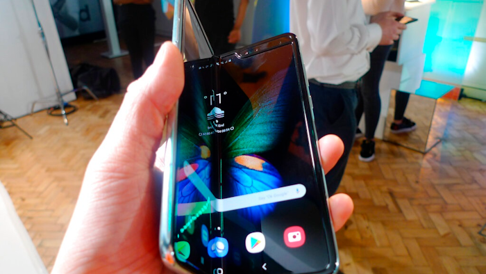 In this Tuesday April 16, 2019 file photo, the Samsung Galaxy Fold smartphone is presented during a media preview event in London. Samsung is hoping the innovation of smartphones with folding screens reinvigorates the market. Samsung says it will start selling its highly anticipated folding phone on Friday Sept. 6, 2019, after its original launch date was delayed by months because of embarrassing problems with the screen.