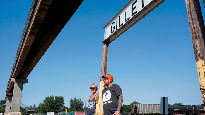 In this Thursday, Sept. 5, 2019 photo shows warehouse technician Melissa Worden, left, and heavy equipment operator Rory Wallet, in downtown Gillette, Wyo. The shutdown of Blackjewel LLC's Belle Ayr and Eagle Butte mines in Wyoming since July 1, 2019, has added yet more uncertainty to the Powder River Basin's struggling coal economy. Both Worden and Wallet wonder if they will get their old jobs back.