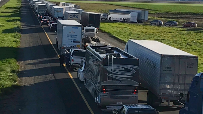 This Feb. 14, 2019, photo released by Caltrans District 3 shows a 7-mile back up on the South bound Interstate 5, as it reopens to traffic in Maxwell in Colusa County, Calif. The Trump administration is poised revoke California’s authority to set auto mileage standards, asserting that only the federal government has the power to regulate greenhouse gas emissions and fuel economy.