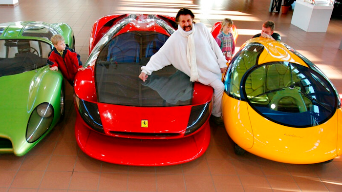 In this Dec. 2, 2006 file photo German designer Luigi Colani poses for photographers in Halle, eastern Germany. Renowned Industrial designer Luigi Colani has died at age 91 in the southwestern German town of Karlsruhe.