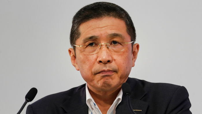 In this July 25, 2019, file photo, Nissan CEO Hiroto Saikawa listens to questions from the media during a news conference at the global headquarters in Yokohama, west of Tokyo. Calls for resignation, which arose after the arrest last year of his predecessor Carlos Ghosn on various financial misconduct allegations, have grown louder after Saikawa acknowledged that he had received dubious payments. The automaker's board is meeting Monday, Sept. 9, 2019 to look into the allegations against Saikawa.