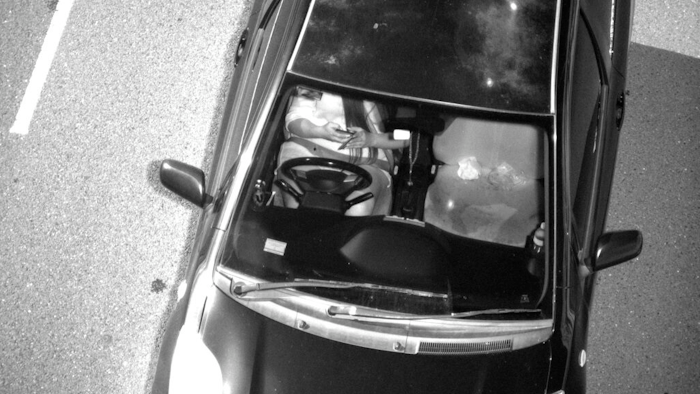 This Jan. 12, 2019, photo captured by a Mobile Phone Detection Camera and released by Transport for NSW shows a driver using a mobile phone while driving in Australia. Australian state New South Wales is attempting to persuade the public to put down their smartphones while driving by rolling out cameras to prosecute distracted motorists. New South Wales Roads Minister Andrew Constance said on Monday, Sept. 23, 2019, Australia’s most populous state was the first jurisdiction in the world to use such technology to punish drivers distracted by social media, text messages or phone calls. The government intends to roll out 45 Mobile Phone Detection Cameras across the state by December, he said.