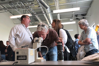 California citrus growers, packers and researchers gather for the opening of a new secure lab dedicated to the search for a cure for a deadly citrus-killing disease in Riverside, CA on Thursday.