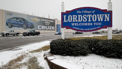 In this Nov. 27, 2018 file photo, a banner depicting the Chevrolet Cruze model vehicle is displayed at the General Motors' Lordstown plant in Lordstown, OH. It’s looking less likely that General Motors will again make vehicles at the Ohio assembly plant that shut down last winter.