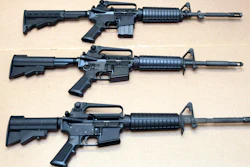 In this file photo, three variations of the AR-15 rifle are displayed.