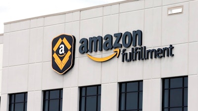 This Monday, July 8, 2019 file photo shows the Amazon Fulfillment warehouse in Shakopee, Minn. Amazon is on the hunt for workers. The online shopping giant is looking to fill more than 30,000 vacant jobs by early next year, and is holding job fairs across the country next week to find candidates. The job fairs will take place Sept. 17, 2019 in six U.S. cities: Arlington, Virginia; Boston; Chicago; Dallas, Texas; Nashville, Tennessee; and Seattle.