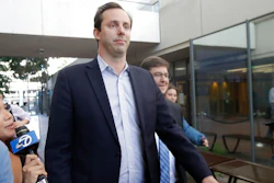 In this Aug. 27, 2019, file photo former Waymo employee Anthony Levandowski, center, leaves a federal courthouse in San Jose, Calif. A federal judge on Wednesday, Sept. 4, rejected a government recommendation that he impose a $10 million bail bond on Levandowski, a former Google engineer. Levandowski is accused of stealing self-driving car technology before joining Uber's effort to build robotic taxis for its ride-hailing service.