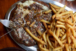 A dish at 'La Reverde' vegan restaurant in Buenos Aires, Argentina. A steak made with wheat gluten and ingredients including beet puree and spices help create a similar tone to beef.