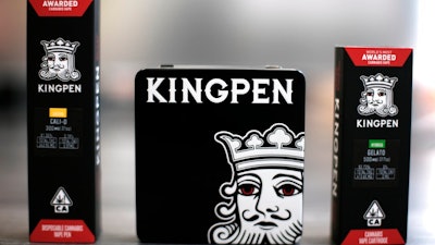 This Tuesday, Sept. 10, 2019, photo shows the new Kingpen packaging, center, flanked by the previous packaging in Los Angeles. Bootleggers eager to profit off unsuspecting consumers are mimicking popular vape brands, pairing replica packaging churned out in Chinese factories with untested, and possibly adulterated, cannabis oil produced in the state's vast underground market. As a result of the bootleggers, the company had to change and innovate their new packaging.