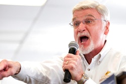 In this March 11, 2018, file photo, Cecil Roberts, president of United Mine Workers of America, speaks at the Greene County Fairgrounds in Waynesburg, Pa. Roberts says plans by Democratic presidential candidates to address climate change must account for thousands of coal workers whose jobs are at risk because of mine closures and competition from cheaper natural gas.