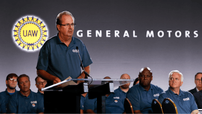 In this July 16, 2019, file photo United Auto Workers President Gary Jones speaks during the opening of their contract talks with General Motors in Detroit.