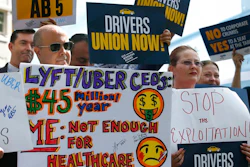 Dozens of supporters of a measure to limit when companies can label workers as independent contractors rally at the Capitol in Sacramento, Calif., Wednesday, Aug. 28, 2019. If approved by the legislature and signed by Gov. Gavin Newsom, AB5, by Assemblywoman Lorena Gonzalez, D-San Diego, would require companies like Uber and Lyft to treat their drivers like employees.