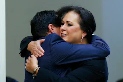 Assemblywoman Lorena Gonzalez, D-San Diego, receives congratulations from Assembly Speaker Anthony Rendon, of Lakewood after her to give new wage and benefit protections at the so-called gig economy companies like Uber and Lyft was approved by the Assembly in Sacramento, Calif., Wednesday, Sept. 11, 2019. The bill now goes to the governor, who has said he supports it.
