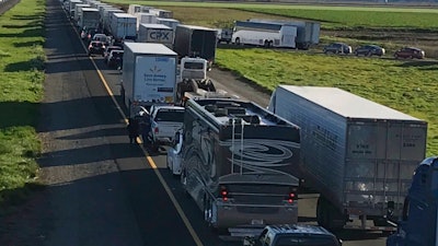 This Feb. 14, 2019, photo released by Caltrans District 3 shows a 7-mile back up on the South bound Interstate 5, as it reopens to traffic in Maxwell in Colusa County, Calif. The Trump administration is poised revoke California’s authority to set auto mileage standards, asserting that only the federal government has the power to regulate greenhouse gas emissions and fuel economy.