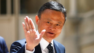 In this May 15, 2019, file photo, founder of Alibaba group Jack Ma arrives for the Tech for Good summit in Paris. Ma is stepping down as chairman at a time when its industry faces rapid change and uncertainty amid a U.S.-Chinese trade war. Ma gave up his post on his 55th birthday as part of a succession announced a year earlier.