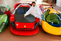 In this Dec. 2, 2006 file photo German designer Luigi Colani poses for photographers in Halle, eastern Germany. Renowned Industrial designer Luigi Colani has died at age 91 in the southwestern German town of Karlsruhe.